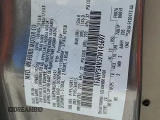 2007 Ford Focus S z VIN 1FAHP34N57W145697, wystawiony jako Copart lot #55335235 z przebiegiem 228 416 mil mil oraz Nie do naprawy • Non repairable. Historia ofert i sprzedaży dostępna na DreamBid. Obrazek 12.