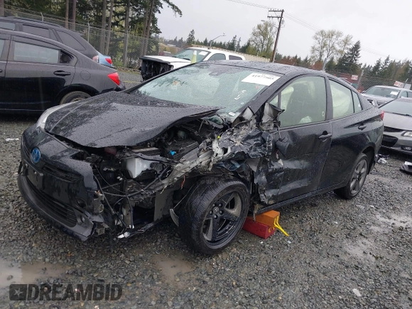 2022 Toyota Prius L Eco with VIN JTDKAMFU2N3154674, listed as a IAAI auction lot 41977505 with 61,552 mi miles and . Bid and sale history available at DreamBid. Image 2.