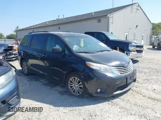 2015 Toyota Sienna XLE with VIN 5TDYK3DC8FS624993, listed as a IAAI auction lot 40295741 with 229,355 mi miles. Bid and sale history available at carsss.com. Image 1.
