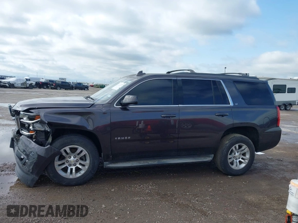 2015 Chevrolet Tahoe LT with VIN 1GNSCBKC2FR632173, listed as a IAAI auction lot 42135105 with 150,033 mi miles and . Bid and sale history available at DreamBid. Image 14.