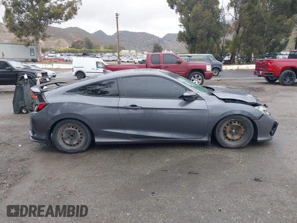 2020 Honda Civic Si with VIN 2HGFC3A57LH753345, listed as a IAAI auction lot 42074785 with 89,069 mi miles and . Bid and sale history available at DreamBid. Image 13.