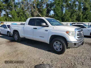 2017 Toyota Tundra SR z VIN 5TFUW5F14HX664169, wystawiony jako Copart lot #57397385 z przebiegiem 242 806 mil mil oraz Czysty tytuł • Clean title. Historia ofert i sprzedaży dostępna na DreamBid. Obrazek 4.