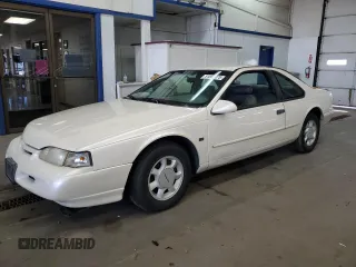 1995 Ford Thunderbird LX with VIN 1FALP62W9SH159185, listed as a Copart auction lot 51862975 with 128,230 mi miles and Clean Title. Bid and sale history available at carsss.com. Image 1.