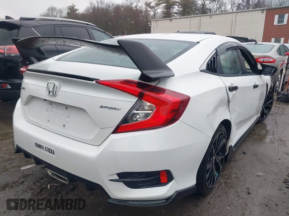 2019 Honda Civic Sport with VIN 2HGFC2F80KH605100, listed as a IAAI auction lot 41825640 with 82,363 mi miles and . Bid and sale history available at DreamBid. Image 4.
