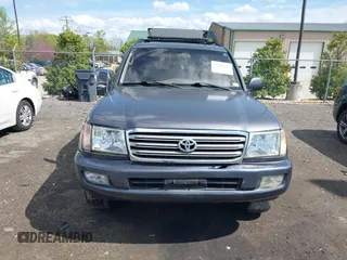 2003 Toyota Land Cruiser z VIN JTEHT05J932041288, wystawiony jako IAAI lot #42000615 z przebiegiem 166 159 mil mil oraz . Historia ofert i sprzedaży dostępna na DreamBid. Obrazek 12.
