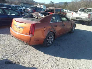 2008 Cadillac CTS AWD w/1SB with VIN 1G6DT57V980188992, listed as a IAAI auction lot 40945087 with 63,744 mi miles. Bid and sale history available at carsss.com. Image 4.