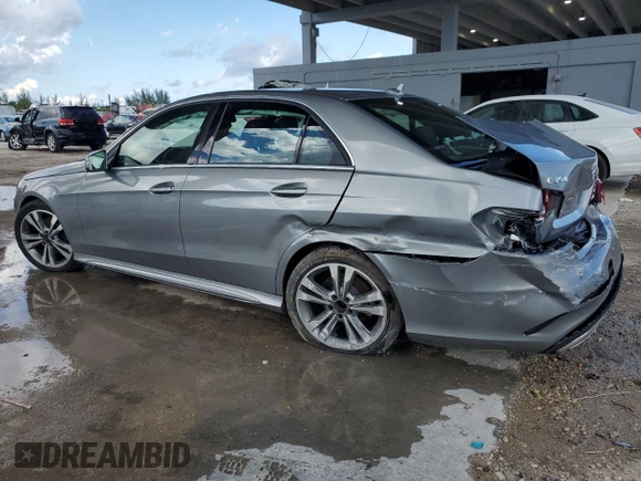 2014 Mercedes-Benz E 350 Sport with VIN WDDHF5KB7EA823075, listed as a Copart auction lot 56886345 with 122,892 mi miles and Salvage title. Bid and sale history available at DreamBid. Image 2.