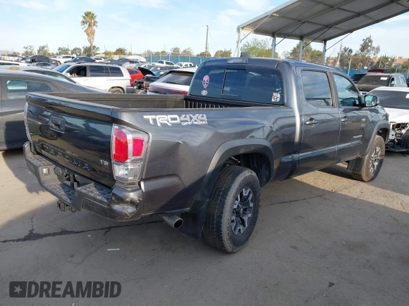 2021 Toyota Tacoma SR5 z VIN 3TMDZ5BN6MM110938, wystawiony jako IAAI lot #41838703 z przebiegiem 67 680 mil mil oraz . Historia ofert i sprzedaży dostępna na DreamBid. Obrazek 4.