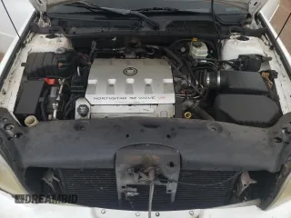 2002 Cadillac DeVille z VIN 1G6KD54Y42U247207, wystawiony jako Copart lot #77691724 z przebiegiem 71 514 mil mil oraz Szkody całkowita. Historia ofert i sprzedaży dostępna na DreamBid. Obrazek 11.