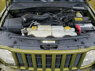 2012 Jeep Liberty Sport z VIN 1C4PJMAK4CW146311, wystawiony jako Copart lot #56643515 z przebiegiem 137 432 mil mil oraz Szkoda całkowita • Salvage title. Historia ofert i sprzedaży dostępna na DreamBid. Obrazek 12.