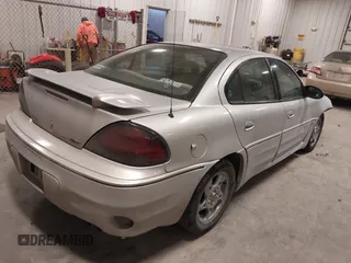 2003 Pontiac Grand Am GT with VIN 1G2NW52E93M605453, listed as a IAAI auction lot 41546839 with 202,918 mi miles. Bid and sale history available at carsss.com. Image 4.