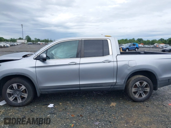 2017 Honda Ridgeline RTL with VIN 5FPYK3F52HB019266, listed as a IAAI auction lot 42638081 with 117,004 mi miles and . Bid and sale history available at DreamBid. Image 14.