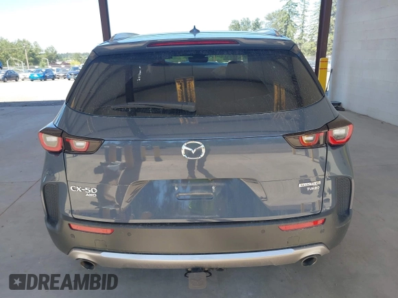 2023 Mazda CX-50 Premium Plus with VIN 7MMVABEY8PN100311, listed as a IAAI auction lot 42626276 with 40,242 mi miles and . Bid and sale history available at DreamBid. Image 16.