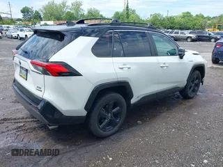 2021 Toyota RAV4 Hybrid XSE with VIN 4T3E6RFV9MU052563, listed as a IAAI auction lot 42295510 with 24,771 mi miles and . Bid and sale history available at DreamBid. Image 4.