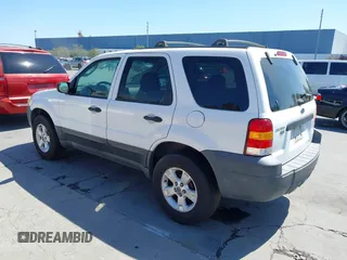 2005 Ford Escape XLT with VIN 1FMCU03195KA67225, listed as a IAAI auction lot 42614934 with 223,473 mi miles and . Bid and sale history available at DreamBid. Image 3.