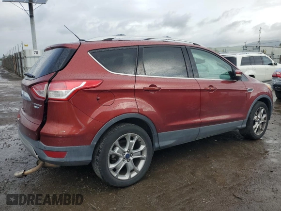2016 Ford Escape Titanium with VIN 1FMCU9J91GUA99767, listed as a Copart auction lot 51172655 with 132,911 mi miles and Salvage title. Bid and sale history available at DreamBid. Image 3.