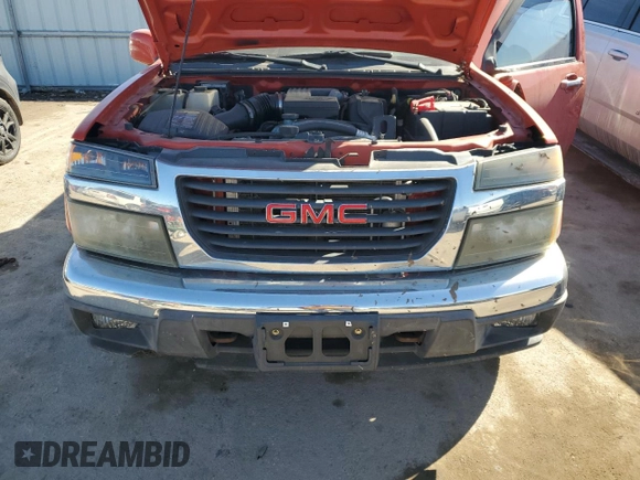 2009 GMC Canyon Work Truck z VIN 1GTDT19EX98142609, wystawiony jako Copart lot #46698275 z przebiegiem 74 910 mil mil oraz Szkoda całkowita • Salvage title. Historia ofert i sprzedaży dostępna na DreamBid. Obrazek 12.