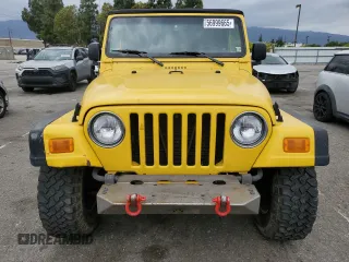 2004 Jeep Wrangler Rubicon with VIN 1J4FA69SX4P768963, listed as a Copart auction lot 56999665 with 91,949 mi miles and Salvage title. Bid and sale history available at DreamBid. Image 5.