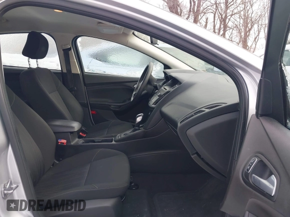2015 Ford Focus SE z VIN 1FADP3F26FL357140, wystawiony jako IAAI lot #41256854 z przebiegiem 194 812 mil mil oraz . Historia ofert i sprzedaży dostępna na DreamBid. Obrazek 5.