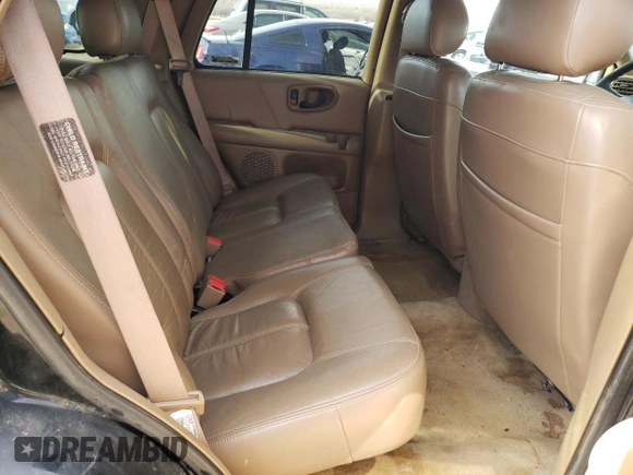 2000 Oldsmobile Bravada z VIN 1GHDT13W3Y2178106, wystawiony jako Copart lot #85069954 z przebiegiem 211 164 mil mil oraz Szkody całkowita. Historia ofert i sprzedaży dostępna na DreamBid. Obrazek 11.