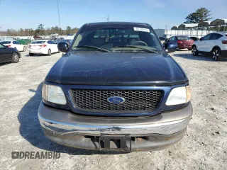 2002 Ford F-150 XLT with VIN 1FTRW07L52KA67609, listed as a Copart auction lot 87720715 with 177,615 mi miles and Salvage Title. Bid and sale history available at carsss.com. Image 5.