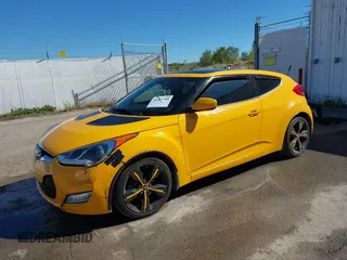 2013 Hyundai Veloster w/Gray Int with VIN KMHTC6AD8DU093272, listed as a IAAI auction lot 40407768 with 91,038 mi miles and . Bid and sale history available at DreamBid. Image 2.