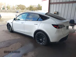 2023 Tesla Model Y Long Range with VIN 7SAYGAEE0PF787216, listed as a IAAI auction lot 41589954 with 17,985 mi miles and . Bid and sale history available at DreamBid. Image 3.