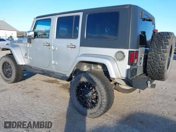 2010 Jeep Wrangler Unlimited Sahara with VIN 1J4BA5H14AL230604, listed as a IAAI auction lot 41884346 with 97,060 mi miles. Bid and sale history available at carsss.com. Image 3.