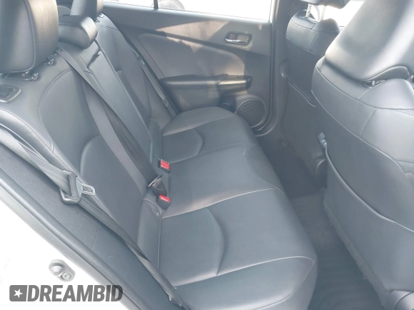 2021 Toyota Prius L Eco z VIN JTDKAMFU9M3131228, wystawiony jako IAAI lot #41257117 z przebiegiem 72 840 mil mil oraz . Historia ofert i sprzedaży dostępna na DreamBid. Obrazek 8.