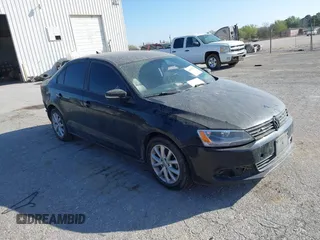2012 Volkswagen Jetta Sedan SE w/Convenience with VIN 3VWDX7AJ3CM394041, listed as a IAAI auction lot 41905471 with 153,837 mi miles. Bid and sale history available at carsss.com. Image 1.