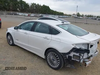 2013 Ford Fusion Titanium Hybrid with VIN 3FA6P0RU5DR357469, listed as a IAAI auction lot 41969315 with 215,732 mi miles. Bid and sale history available at carsss.com. Image 3.