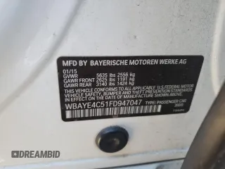 2015 BMW 7 Series 740Li with VIN WBAYE4C51FD947047, listed as a Copart auction lot 86773284 with 90,714 mi miles and Salvage Title. Bid and sale history available at DreamBid. Image 12.