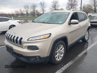 2014 Jeep Cherokee Latitude with VIN 1C4PJLCB8EW191911, listed as a IAAI auction lot 41956728 with 123,643 mi miles. Bid and sale history available at carsss.com. Image 17.