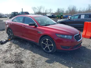 2014 Ford Taurus SHO with VIN 1FAHP2KT0EG123352, listed as a IAAI auction lot 41759502 with 161,467 mi miles. Bid and sale history available at carsss.com. Image 1.