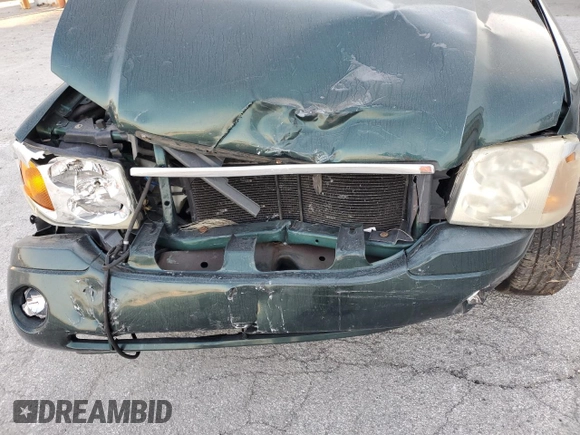 2005 GMC Envoy SLT with VIN 1GKDS13S652329610, listed as a Copart auction lot 76384914 with Not Provided miles and Salvage Title. Bid and sale history available at DreamBid. Image 12.