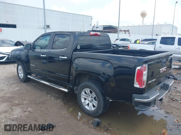2015 GMC Canyon 2WD SLE with VIN 1GTG5BE3XF1226497, listed as a IAAI auction lot 42106960 with 97,360 mi miles and . Bid and sale history available at DreamBid. Image 3.