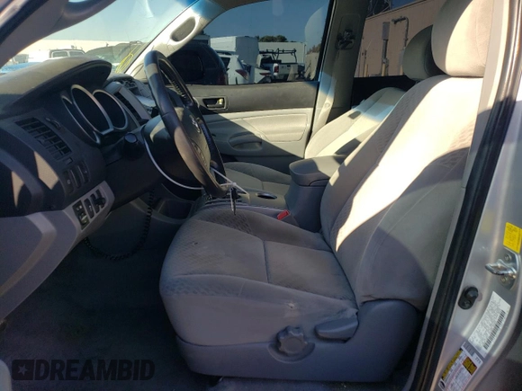 2011 Toyota Tacoma PreRunner with VIN 3TMJU4GN9BM118078, listed as a Copart auction lot 73394074 with 168,574 mi miles and Salvage Title. Bid and sale history available at DreamBid. Image 7.