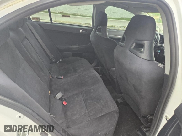 2010 Mitsubishi Lancer Evolution GSR with VIN JA32W8FV3AU021698, listed as a Copart auction lot 80026994 with 10,075 mi miles and Clean Title. Bid and sale history available at DreamBid. Image 6.