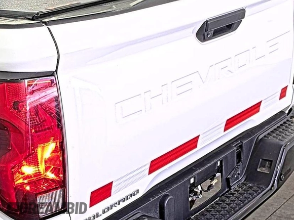 2023 Chevrolet Colorado 4WD Work Truck z VIN 1GCGTBEC2P1200144, wystawiony jako IAAI lot #42626480 z przebiegiem 29 151 mil mil oraz . Historia ofert i sprzedaży dostępna na DreamBid. Obrazek 13.