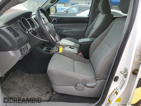 2013 Toyota Tacoma with VIN 3TMLU4EN6DM116738, listed as a Copart auction lot 52807235 with 178,245 mi miles and Salvage title. Bid and sale history available at DreamBid. Image 7.