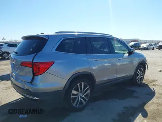 2017 Honda Pilot Touring with VIN 5FNYF5H93HB008088, listed as a IAAI auction lot 41699129 with 110,830 mi miles. Bid and sale history available at carsss.com. Image 4.