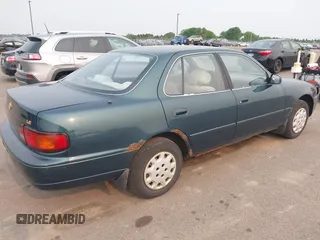 1996 Toyota Camry DX z VIN JT2BG12K0T0417267, wystawiony jako IAAI lot #42386332 z przebiegiem 222 688 mil mil oraz . Historia ofert i sprzedaży dostępna na DreamBid. Obrazek 4.