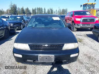 1996 Nissan Altima XE with VIN 1N4BU31D1TC119359, listed as a IAAI auction lot 41664170 with 140,672 mi miles and . Bid and sale history available at DreamBid. Image 13.