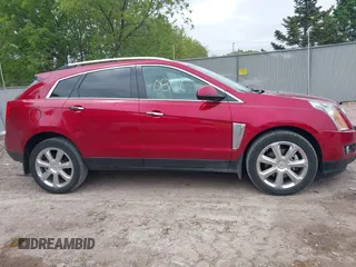 2016 Cadillac SRX Performance Collection z VIN 3GYFNCE39GS504754, wystawiony jako IAAI lot #42290812 z przebiegiem 29 866 mil mil oraz . Historia ofert i sprzedaży dostępna na DreamBid. Obrazek 13.