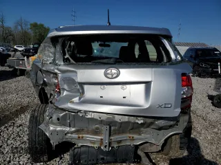 2013 Scion xD with VIN JTKKUPB40D1035989, listed as a Copart auction lot 52076475 with 213,548 mi miles and Salvage Title. Bid and sale history available at carsss.com. Image 6.