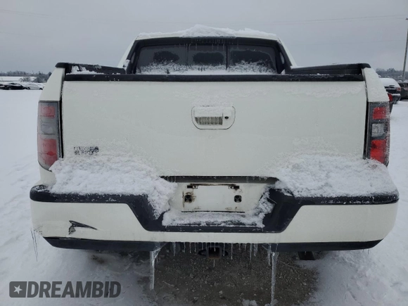 2013 Honda Ridgeline RTL with VIN 5FPYK1F54DB012107, listed as a Copart auction lot 87448454 with 113,178 mi miles and Salvage title. Bid and sale history available at DreamBid. Image 6.