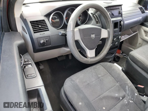 2008 Dodge Grand Caravan SE with VIN 2D8HN44H48R680046, listed as a Copart auction lot 42169125 with 198,035 mi miles and Salvage Title. Bid and sale history available at DreamBid. Image 8.