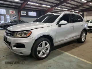 2012 Volkswagen Touareg Exec with VIN WVGEF9BP9CD009937, listed as a Copart auction lot 84596364 with 97,431 mi miles and Clean Title. Bid and sale history available at DreamBid. Image 1.
