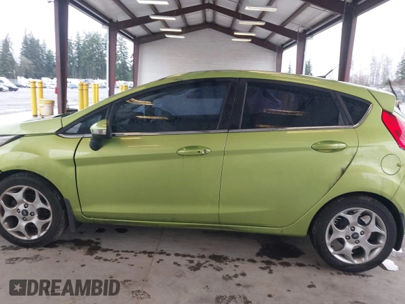 2011 Ford Fiesta SES with VIN 3FADP4FJ7BM127600, listed as a IAAI auction lot 41657170 with 135,483 mi miles. Bid and sale history available at carsss.com. Image 15.