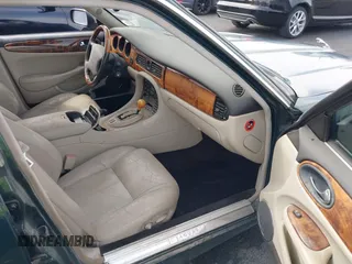 2003 Jaguar XJ with VIN SAJDA15B73MF53499, listed as a IAAI auction lot 41896445 with 95,055 mi miles and . Bid and sale history available at DreamBid. Image 5.